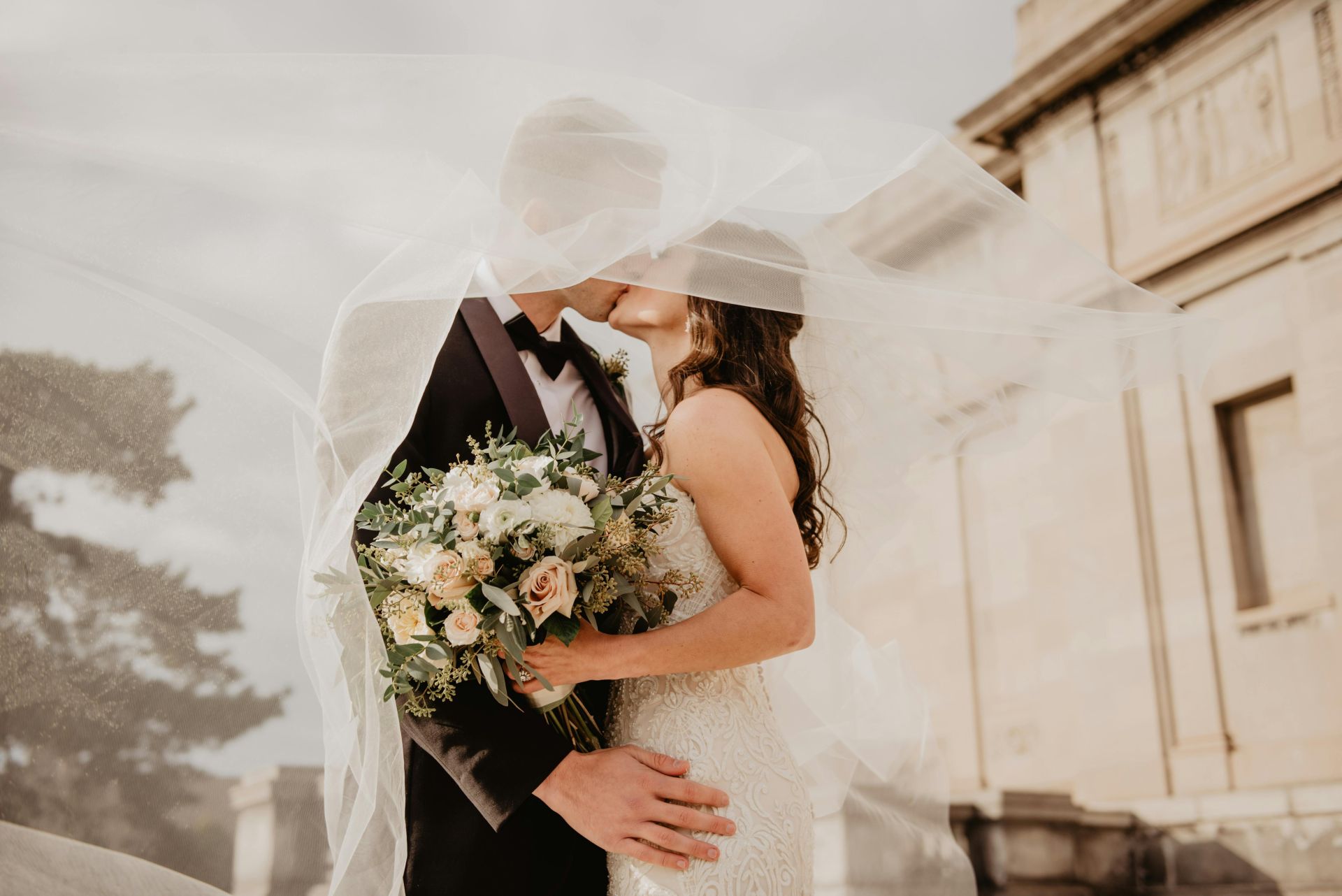 Bride and groom kissing