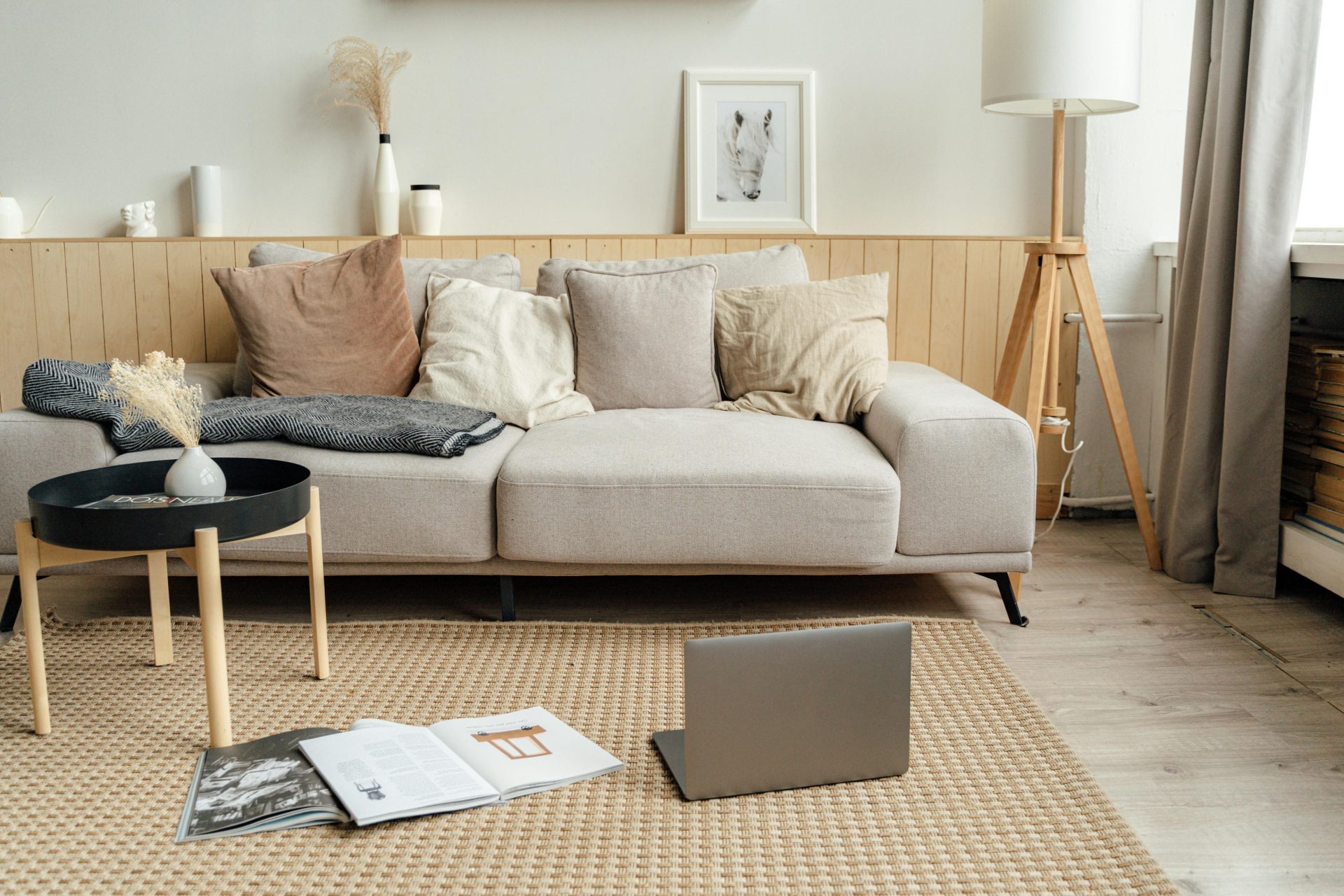 A beautiful neutral living room showing you how to make a house feel like home